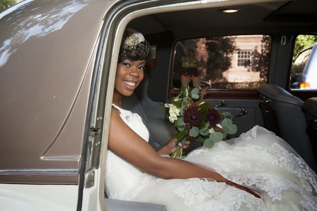 Bride Sitting Inside the Bridal Car