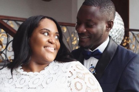 Bride and Groom Smiling at Each Other
