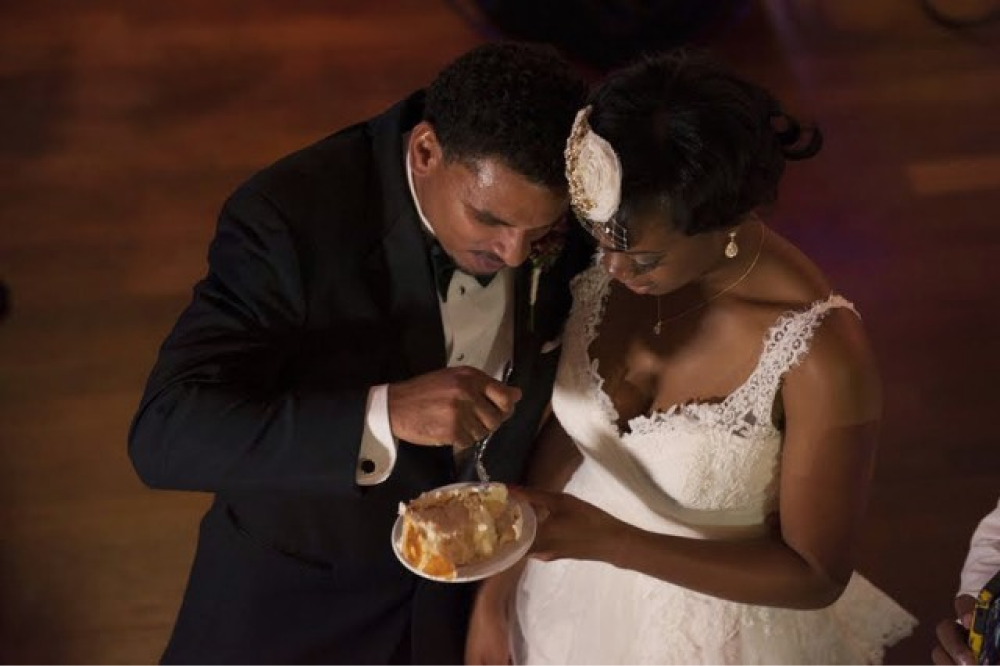 Bride & Groom Eating Cake