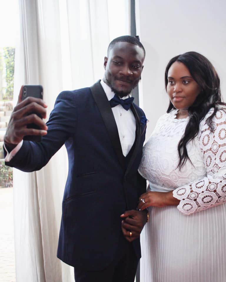 Groom Taking Selfie with Bride